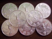 Monedas de plata brillante